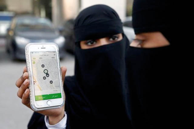 A Saudi woman shows the Careem app on her mobile phone in Riyadh, Saudi Arabia (Reuters file photo)